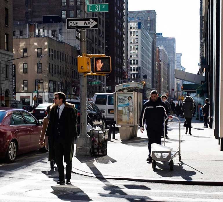 Man walking in New York Street