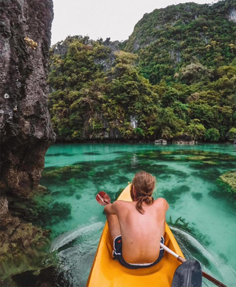 man on kayak in El Nido