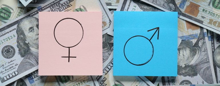 Symbols for female and male on pink and blue sticky notes on top of a pile of money - symbolising the gender pay gap.