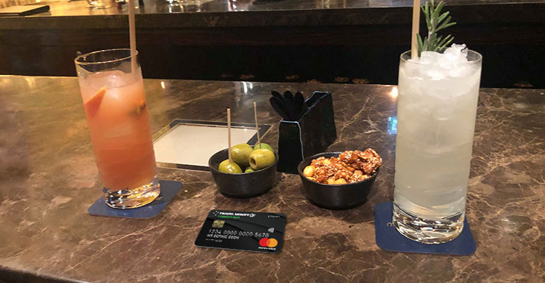 Cocktails and currency pass