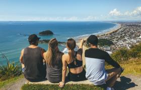 Friends overlooking ocean